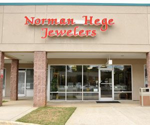 Norman-Hege-Jewelers-front-of-building Norman Hege Jewelers | The front of Norman Hege Jewelers' building showing their sign and front glass doors