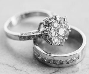 Norman-Hege-Jewelers-diamond-rings Norman Hege Jewelers | Diamond engagement ring and diamond encrusted wedding band set in platinum